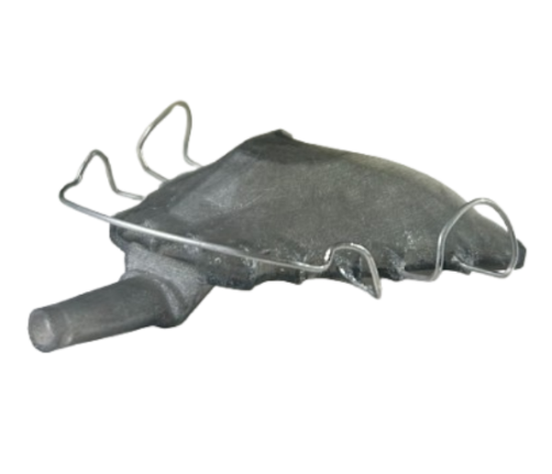 This is suction device we created to distribute suction across the surface of the tongue so that it may be held to the roof of mouth during sleep. There are holes on the bottom surface of the device to do so.